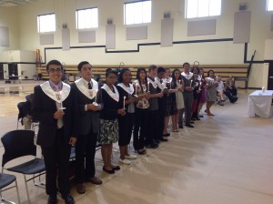 The students attending the NHS ceremony in the gym